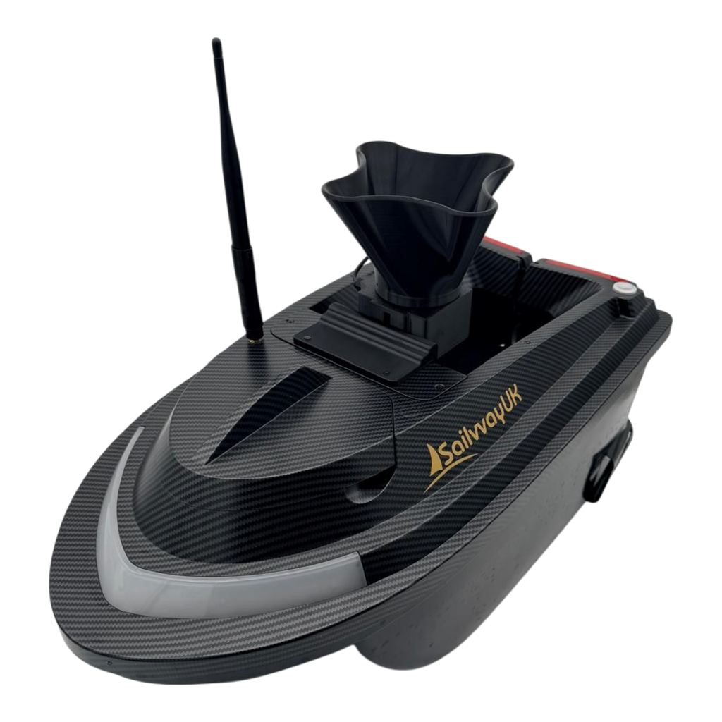 Sailvvay UK X-Series bait boat featuring a black carbon fiber finish and an integrated AUX-powered bait spreader.